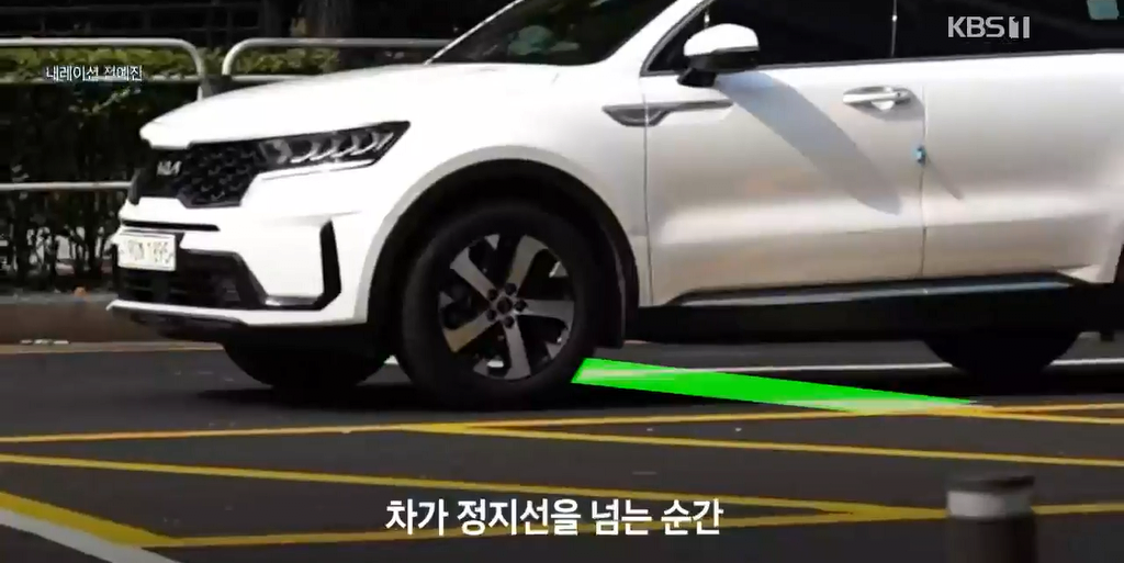 정지선 위반을 무려 80%나 줄여준 전광판